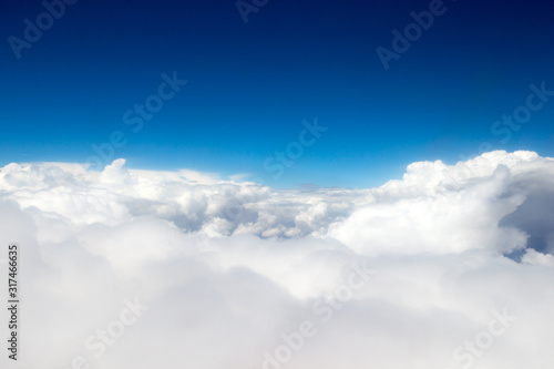 Clouds, a view from airplane window. Sky background © photolink