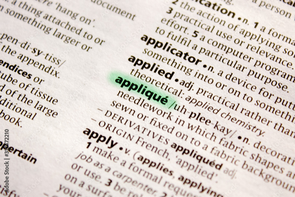 Fototapeta premium Appliqu? word or phrase in a dictionary.