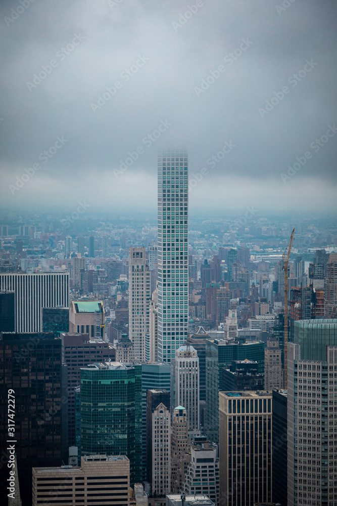 Tall building standing out of cityscape in NYC