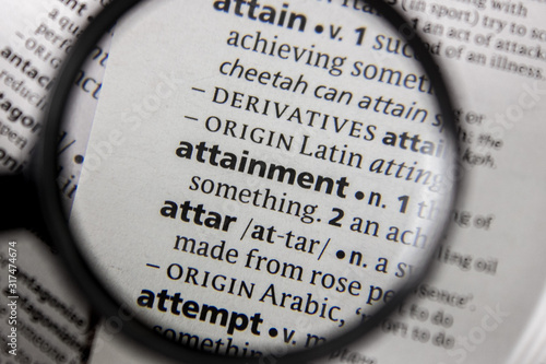 The word or phrase attainment in a dictionary.