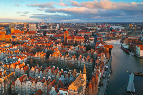 Aerial scenery of the old town in Gdansk over Motlawa river at sunrise, Poland.