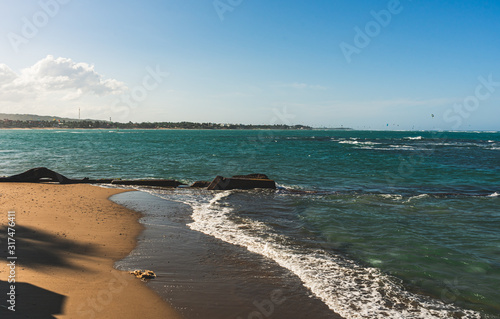 Beautiful landscape of tens of kites at Cabarete beach, Puerto Plata, Dominican Republic photo