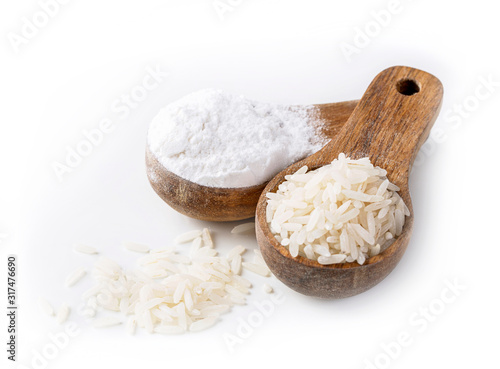 Rice flour in a wooden spoon photo