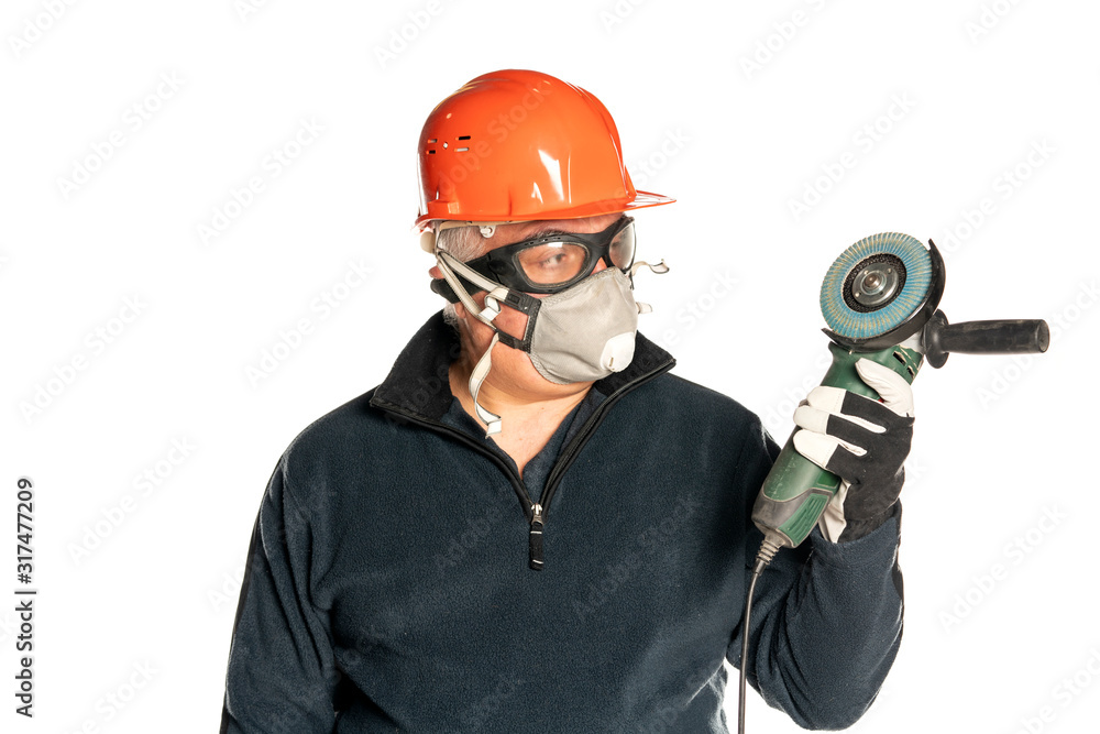 man with angle grinder and protective equipment man with angle grinder and protective equipment