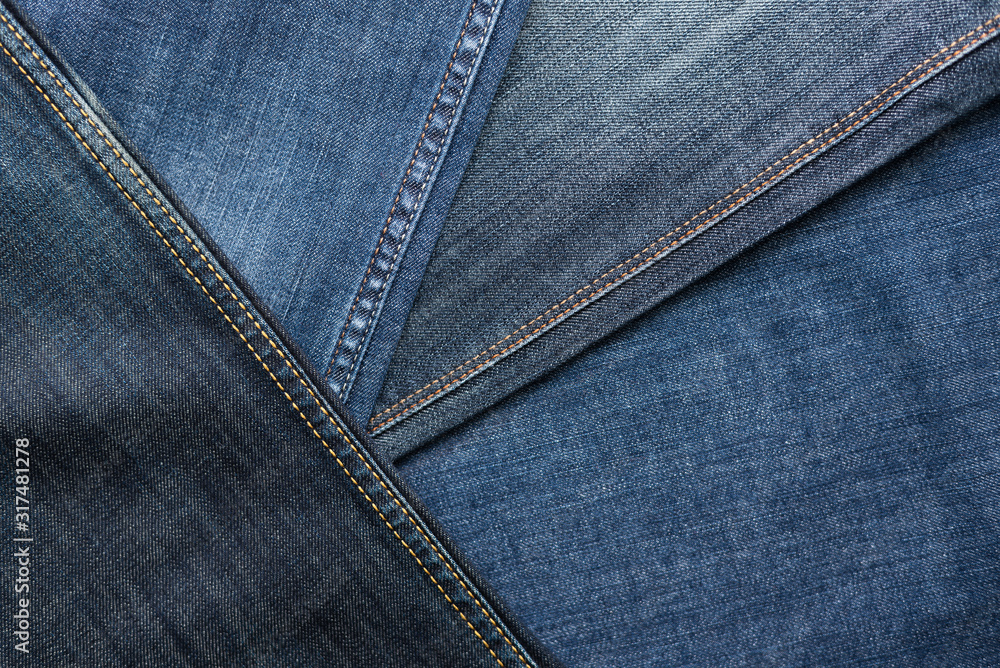 The jeans of various shades in a pile - Stock Image - Everypixel