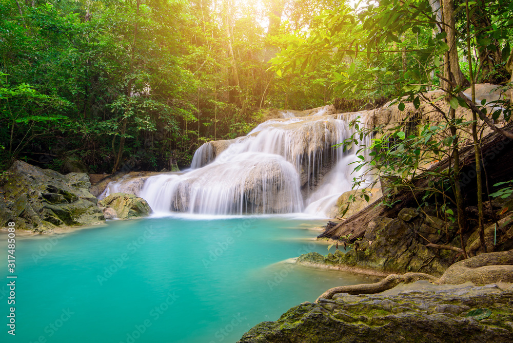 Waterfall in Tropical forest at Erawan waterfall National Park, Thailand Waterfall in Tropical forest at Erawan waterfall National Park, Thailand