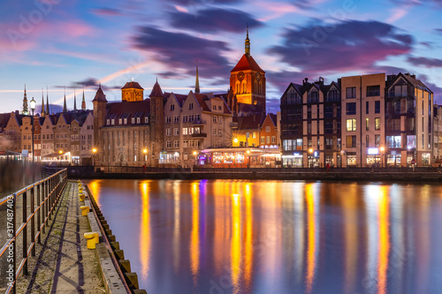 Old Town of Gdansk, Dlugie Pobrzeze, Bazylika Mariacka or St Mary Church, City hall and Motlawa River at sunset, Poland photo