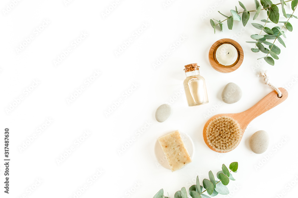 Spa Background. Natural/Organic spa cosmetics products, eco friendly bathroom accessories, eucalyptus leaves. Skincare concept on white background. Flat lay, top view Spa Background. Natural/Organic spa cosmetics products, eco friendly bathroom accessories, eucalyptus leaves. Skincare concept on white background. Flat lay, top view