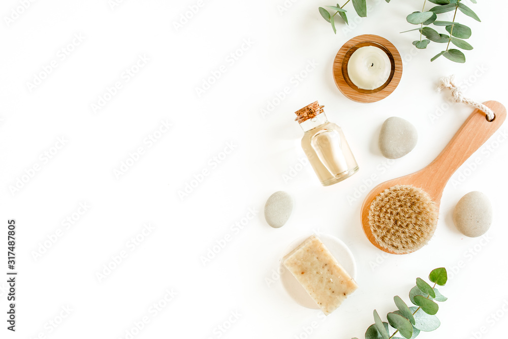 Spa concept with eucalyptus oil and eucalyptus leaf extract natural /organic spa cosmetics products, eco friendly bathroom accessories. Skincare concept on white background. Flat lay composition Spa concept with eucalyptus oil and eucalyptus leaf extract natural /organic spa cosmetics products, eco friendly bathroom accessories. Skincare concept on white background. Flat lay composition