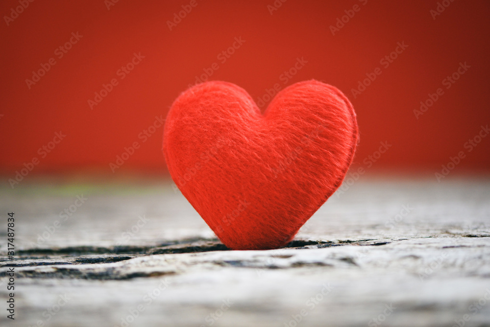 Holidays card Valentines day red heart on old wood for philanthropy concept - Hearts on a wooden background donate help give love take care Holidays card Valentines day red heart on old wood for philanthropy concept - Hearts on a wooden background donate help give love take care