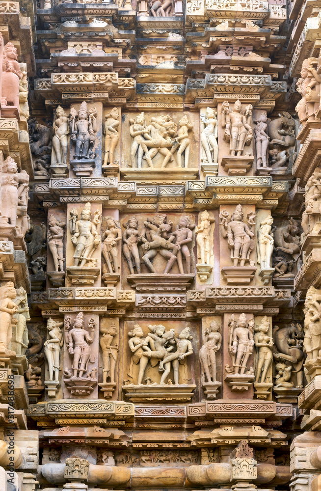 Close up of artful carved walls of Kandariya Mahadeva Temple, Khajuraho Group of Monuments, India