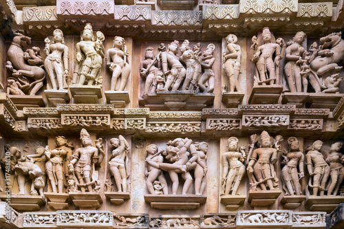 Close up of artful carved walls of Kandariya Mahadeva Temple, Khajuraho Group of Monuments, India