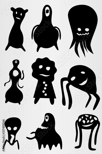 A set of nine small monsters. Small black creatures.
