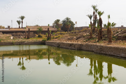 The Sacred Lake in the Temple of Amun at Karnak temple. Luxor, Egypt