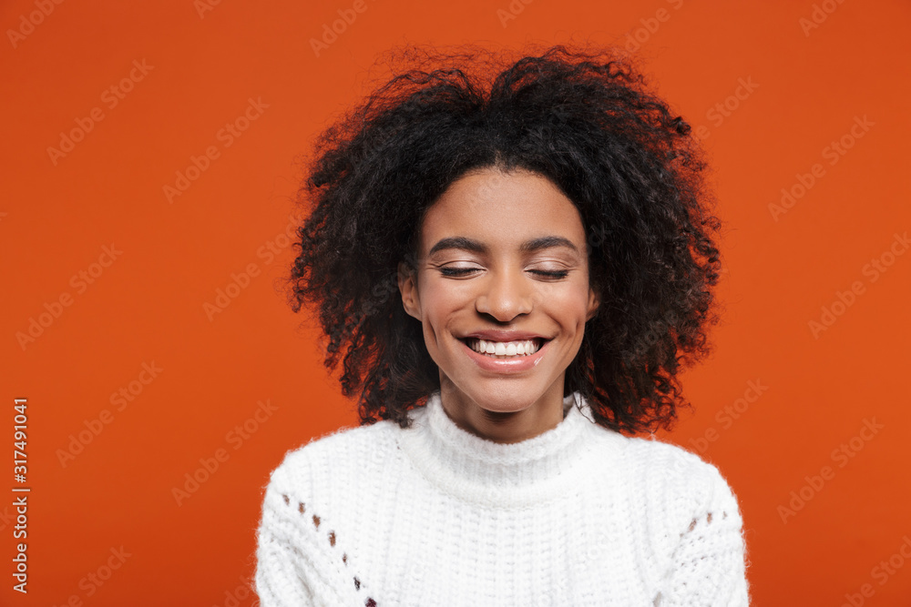 Beautiful young african woman wearing sweater Beautiful young african woman wearing sweater