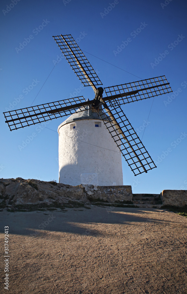 Windmill in La Mancha, Spain, a sunny day with blue sky