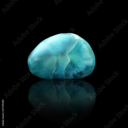 Blue Larimar on a black background photo