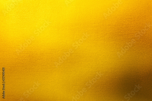 abstract background. shiny yellow of gold foil texture