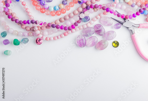 Stone beads, crystals, pliers for beadwork