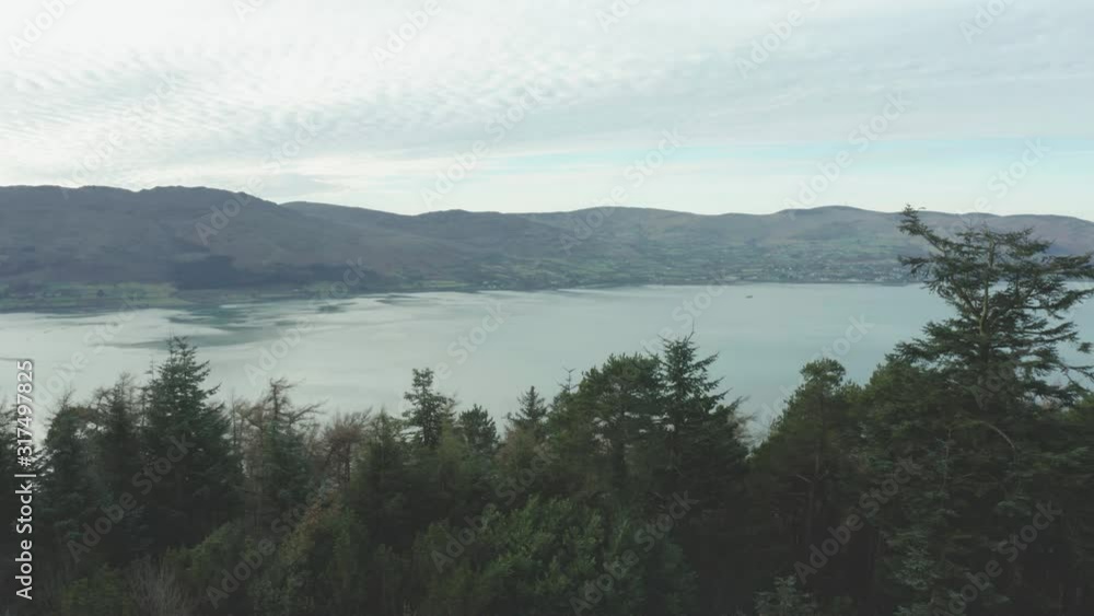 Aerial Flight view of rostrevor mountain and calingford lough, Newry, Northern Ireland during Winter time. Hiking And Tourism Concept Aerial Flight view of rostrevor mountain and calingford lough, Newry, Northern Ireland during Winter time. Hiking And Tourism Concept