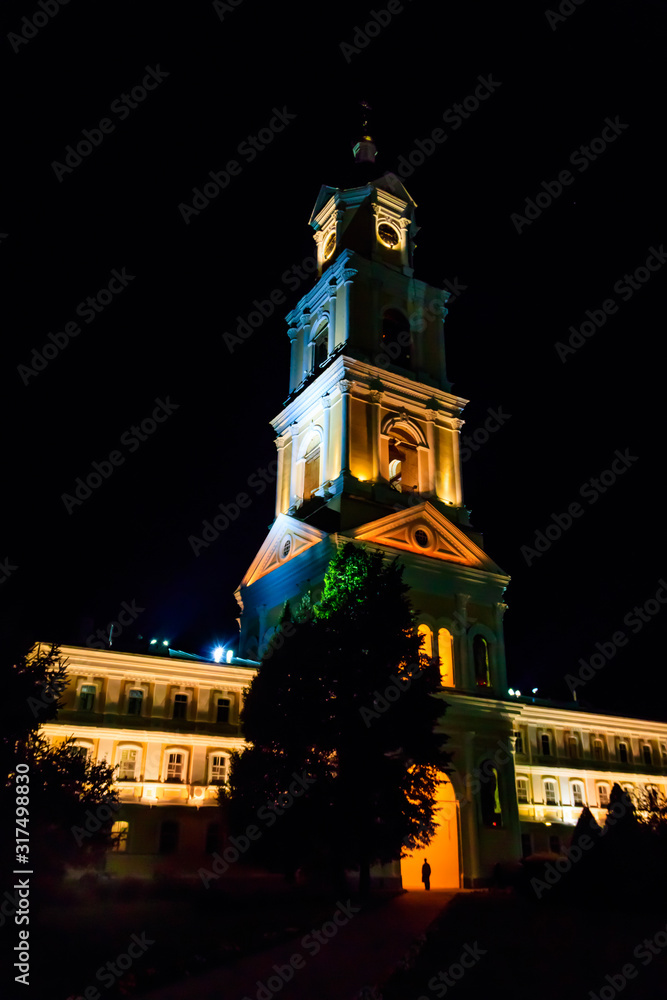 Naklejka premium Bell tower of Holy Trinity-Saint Seraphim-Diveyevo Monastery at night. Diveyevo, Russia