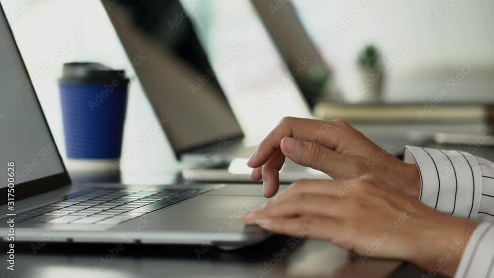 4k video of hands of men who typing laptop keyboard sitting at desk and working at laptop computer at home with laptop. 4k video of hands of men who typing laptop keyboard sitting at desk and working at laptop computer at home with laptop.
