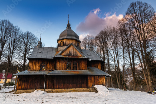 Fototapeta Naklejka Na Ścianę i Meble -  Exterior of St. Nicholas Orthodox Church in Chmiel.  Bieszczady Architecture in Winter. Carpathia Region in Poland