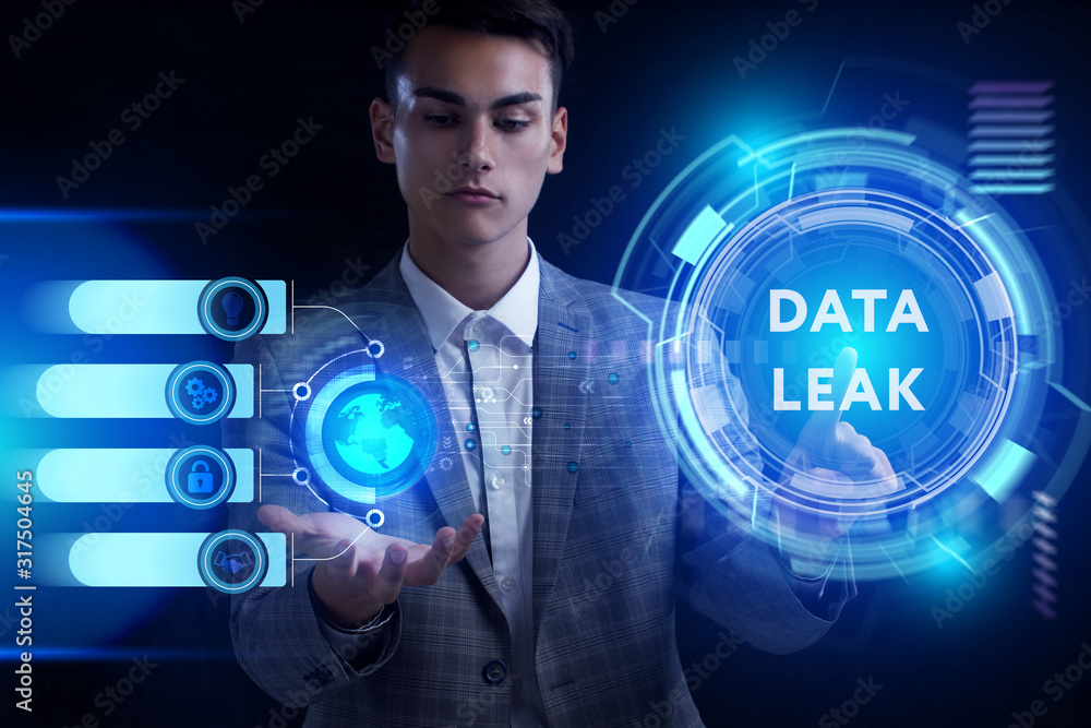 Business, Technology, Internet and network concept. Young businessman working on a virtual screen of the future and sees the inscription: Business, Technology, Internet and network concept. Young businessman working on a virtual screen of the future and sees the inscription: