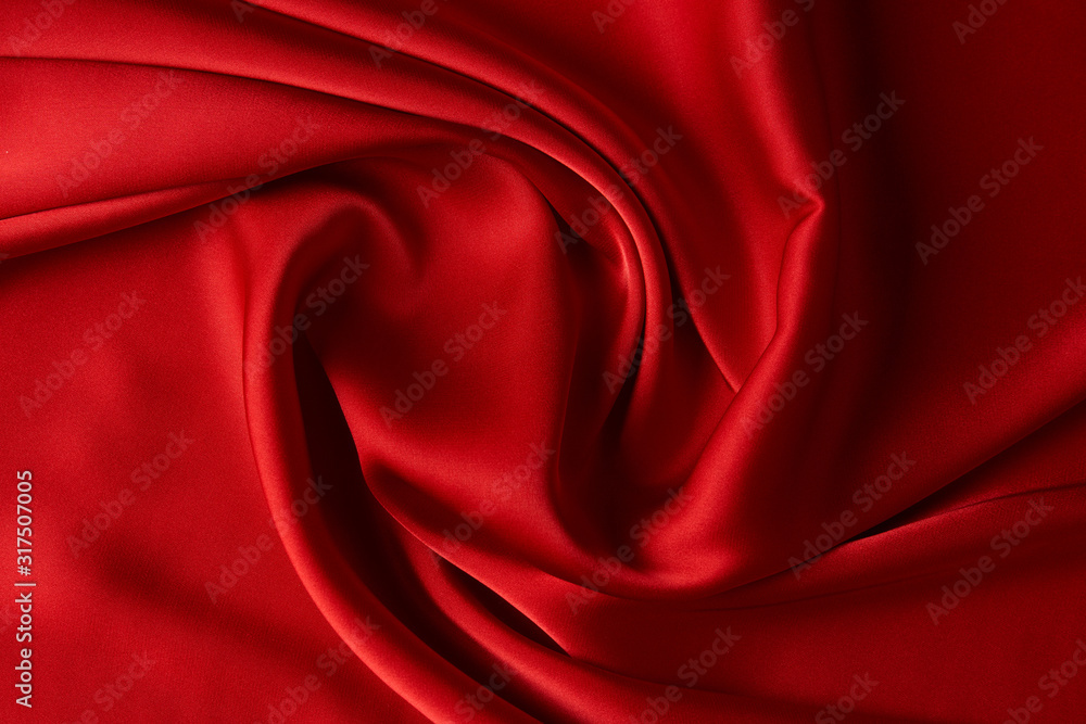 Red ruby color silk fabric background, top view Red ruby color silk fabric background, top view