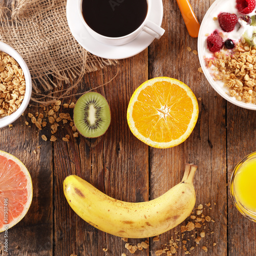 Fototapeta Naklejka Na Ścianę i Meble -  health food concept- fruit smile- healthy breakfast