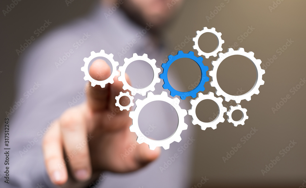 Business, Internet and technology concept. Business select gear icon on virtual screen. Business, Internet and technology concept. Business select gear icon on virtual screen.
