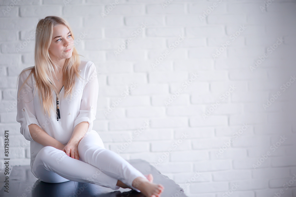 cute blond young adult / portrait of an adult beautiful girl model with blond hair in a happy image cute blond young adult / portrait of an adult beautiful girl model with blond hair in a happy image