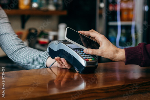 Payment transaction with smartphone  photo