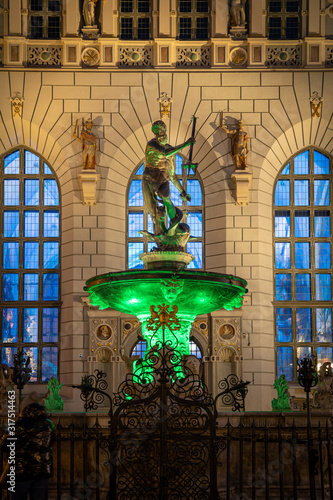 Gdansk, Poland, old town, Statue of Neptune, symbol of Gdansk, with Artus Court in the back.