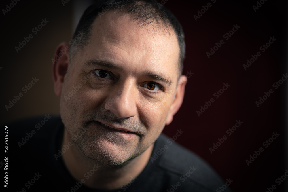 Portrait of middle age man, with unshaved face. Portrait of middle age man, with unshaved face.