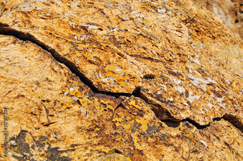 Yellow stone texture from Altai rocky moumtains photo