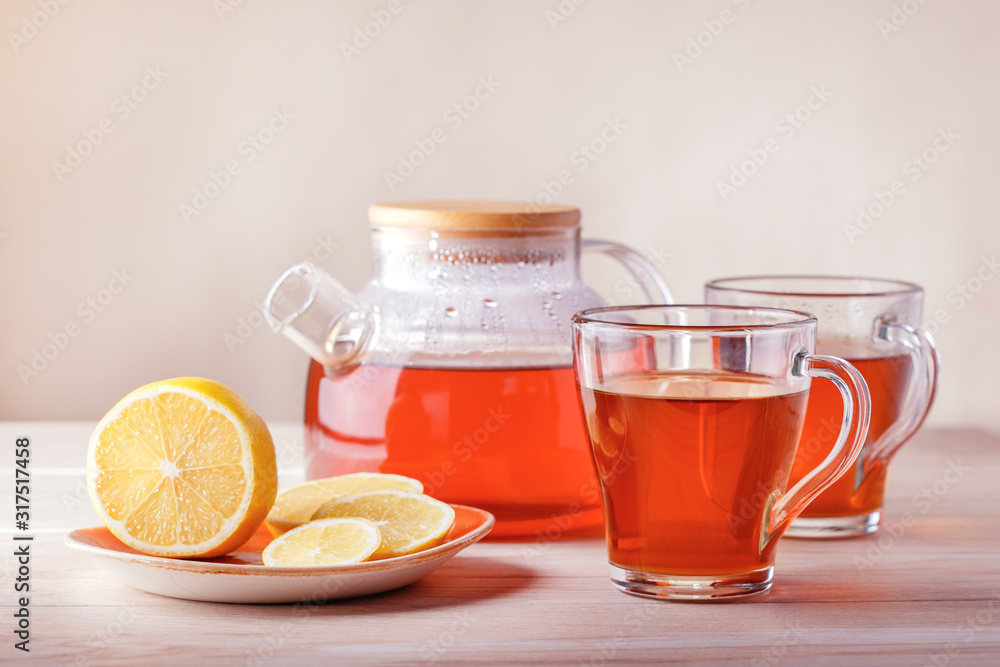 Hot tea with citrus on table, close-up. Hot tea with citrus on table, close-up.