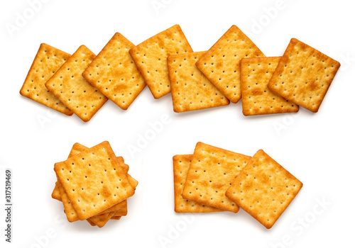 Crushed dry cracker cookies isolated on white background. photo