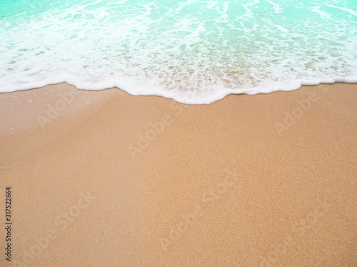 Beach top view.beach sand and blue sea in thailand. summer holiday travel concept. © wing-wing