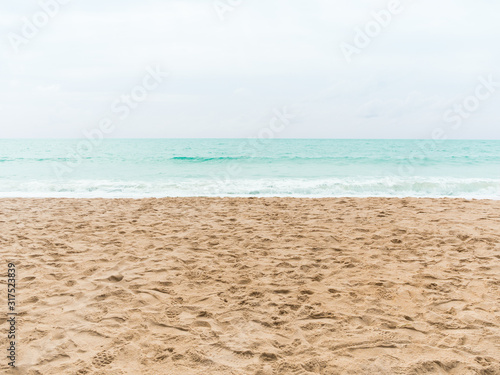 Beach sand and blue sea in thailand. summer holiday travel concept.