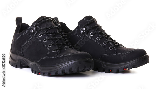 Pair of black male boots isolated over white background