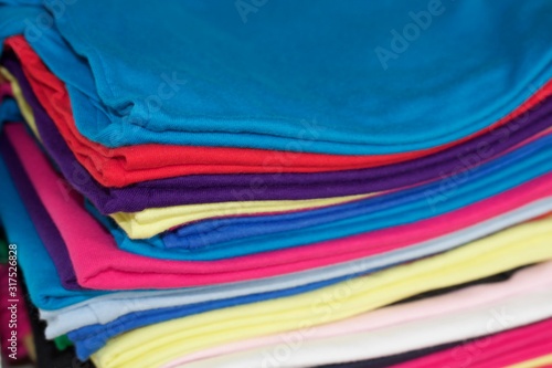 t shirts fabric multicoloured pile of shirts