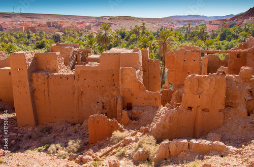 Ancient kasbah ruins and palm oasis in Tinghir Morocco photo