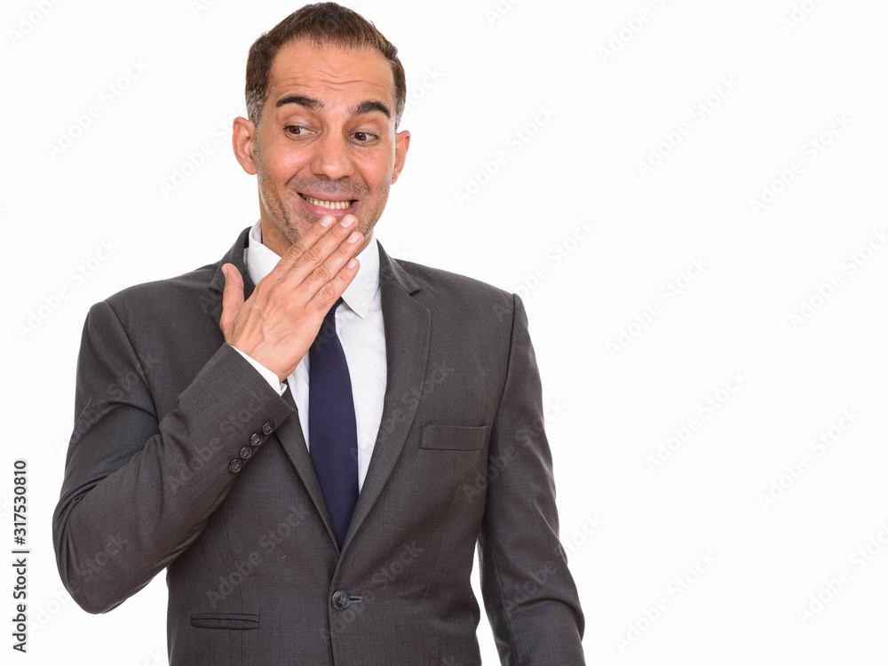 Portrait of mature Persian businessman looking guilty Portrait of mature Persian businessman looking guilty