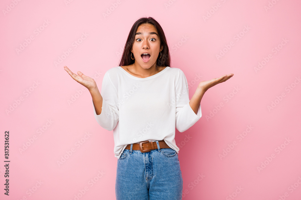 Young mixed race indian woman surprised and shocked. Young mixed race indian woman surprised and shocked.