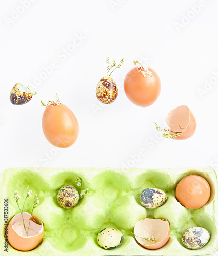 Fototapeta Naklejka Na Ścianę i Meble -  Happy Easter background with flying chicken and quail eggs