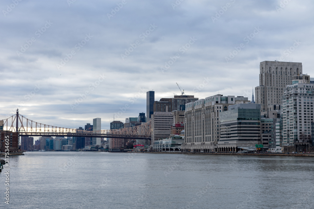 Upper East Side Manhattan Skyline with the Queensboro Bridge in New York City along the East River