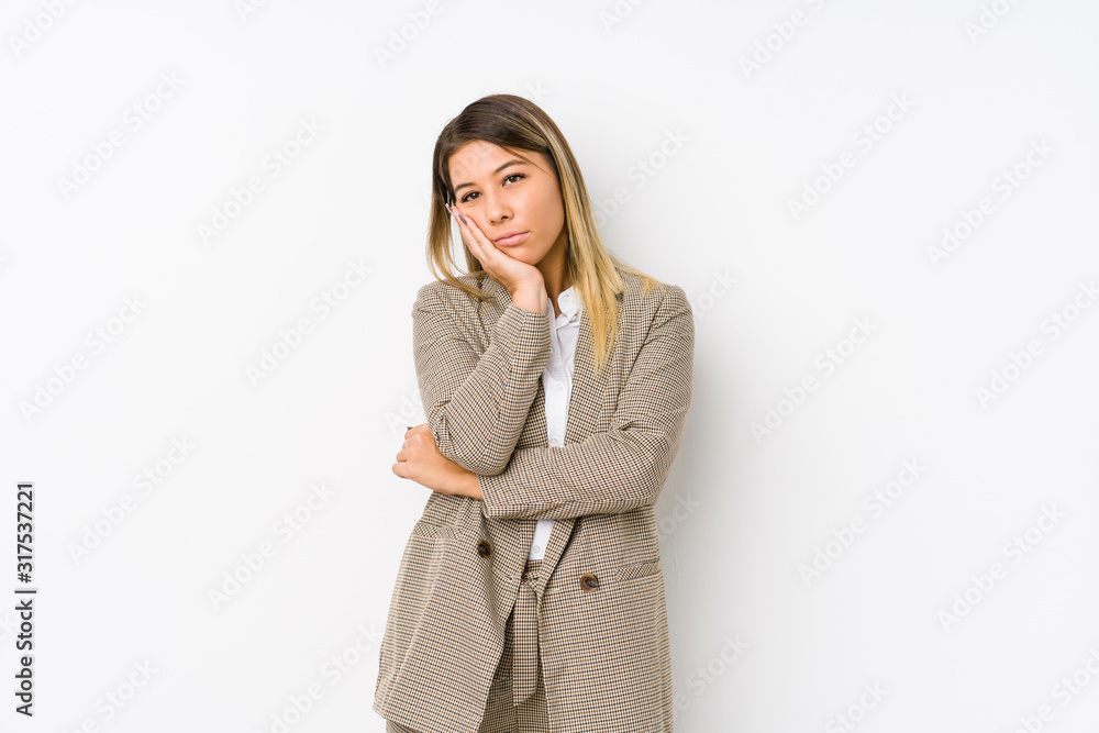 Young caucasian business woman isolated who is bored, fatigued and need a relax day. Young caucasian business woman isolated who is bored, fatigued and need a relax day.