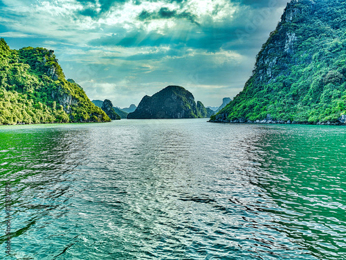 beautiful green limestone mountains in halon bay photo