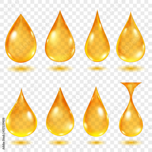 Set of translucent water drops in yellow colors in various shapes, isolated on transparent background. Transparency only in vector format